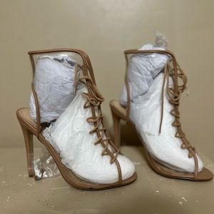 Nude, transparent Shoe Dazzle heels, only worn once, size 5.5 true to size.